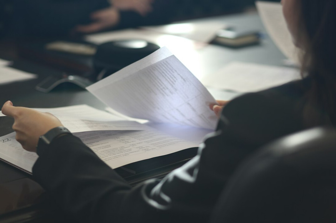 woman reviewing financial documents